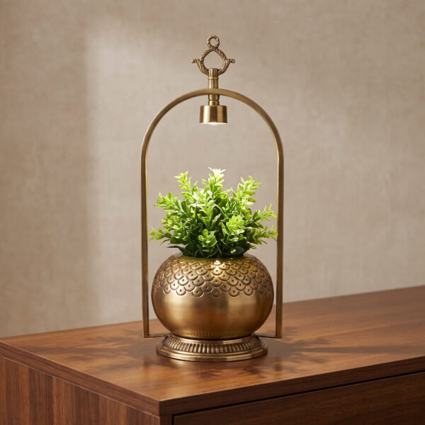 Antique gold illuminated arch planter from HAR & HUES Décor
